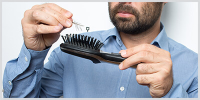 [Translate to en_DE:] Erblich bedingter Haarausfall bei Männern